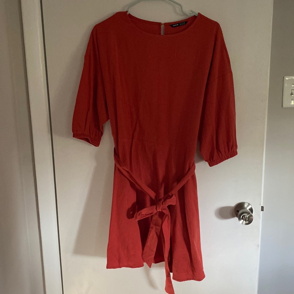 Cotton sundress. Never worn. Elastic at the bottom of sleeves.